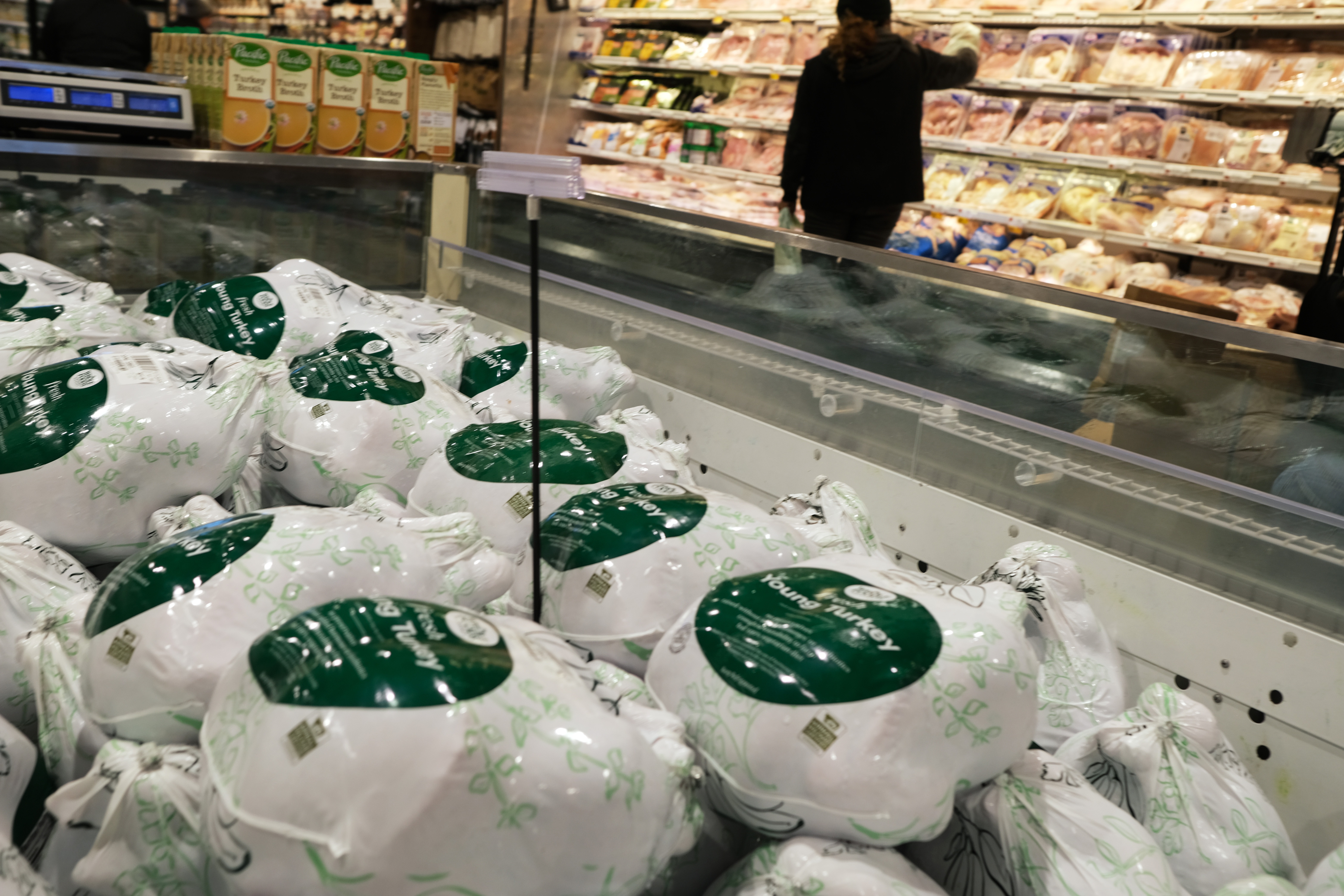 Frozen turkeys are displayed for sale inside a grocery store on Nov. 14, 2022 in New York City.